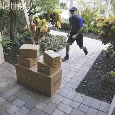 A mover carrying a couch